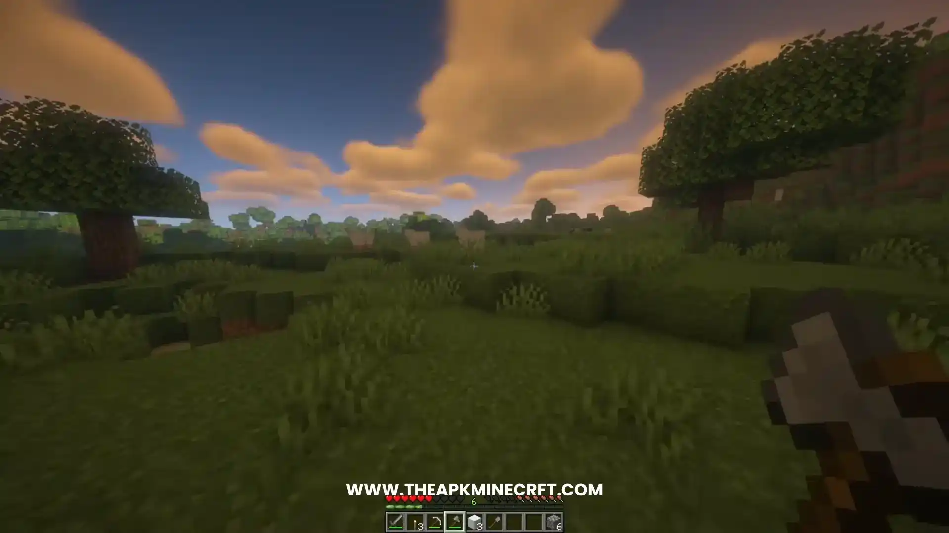 Minecraft Survival Mode scene featuring a player exploring a lush grassy biome with trees and a serene sunset, highlighting the balance of exploration, crafting, and resource management essential for survival.