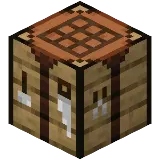 A crafting table in Minecraft, a key item used for crafting and organizing resources.